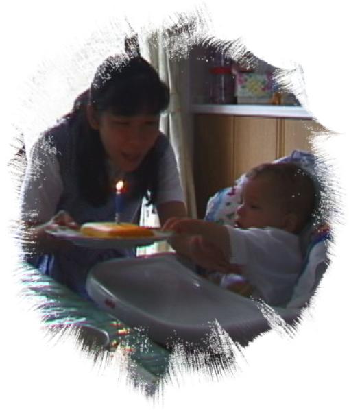 Mama blows the candle. I take the cake.